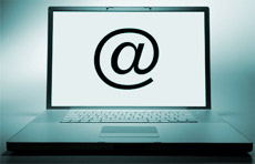 Contact us graphic - computer with @ sign. 